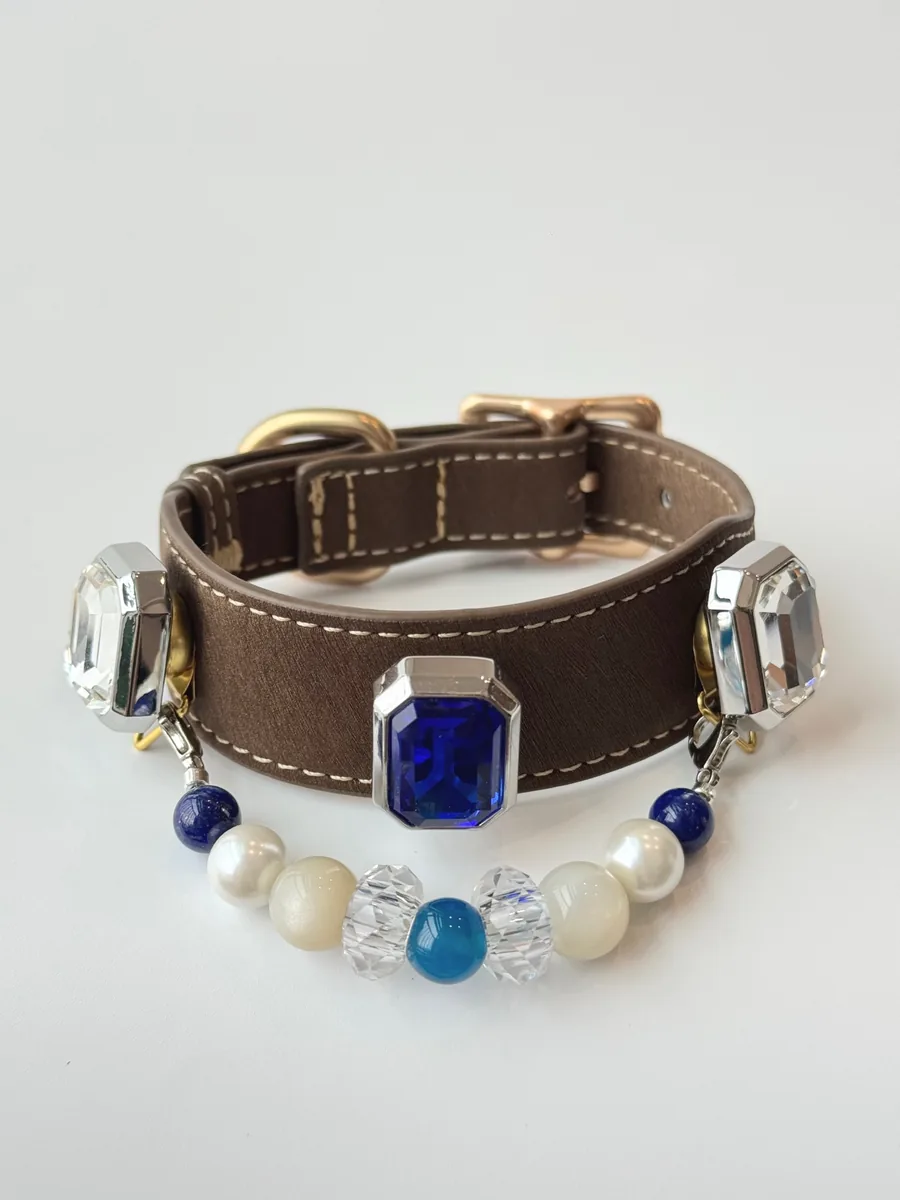 Ocean Whisper Sapphire — deep blue stones that flatter every coat